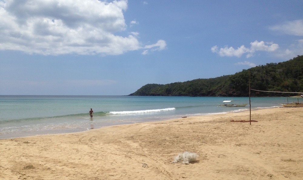 Enjoying the day in Nagtabon Beach, Palawan | Tikigo Tips